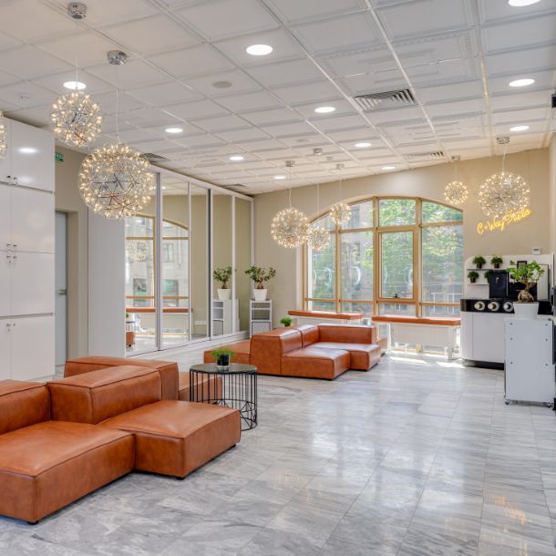 Lobby of a building with couches 